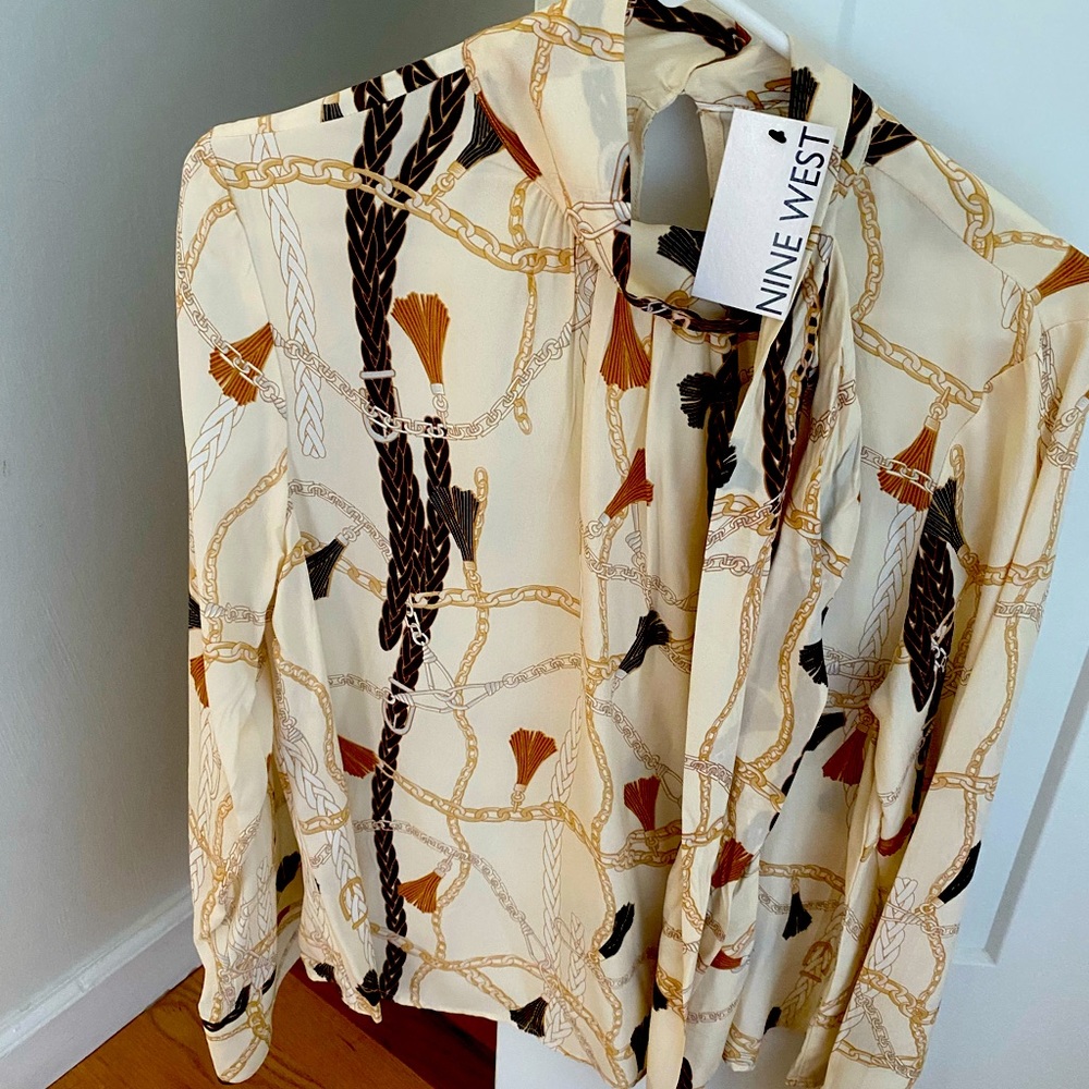 Nine West woman’s new blouse. Size medium.